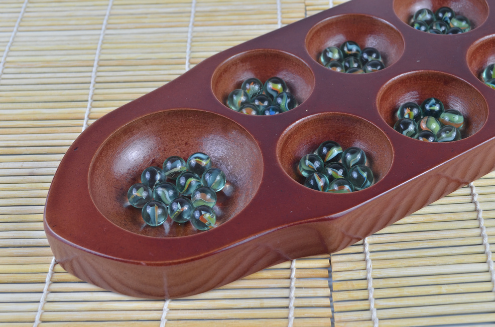 Congkak (selective focus and shallow DOF) is a traditional game in asia